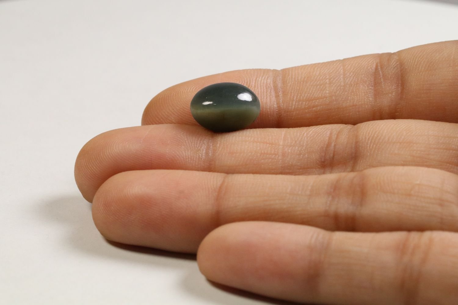 CE1542 3 Cat's Eye 5.42 Ct.